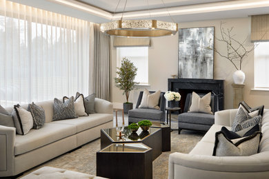Inspiration for a transitional dark wood floor, brown floor and tray ceiling living room remodel in Salt Lake City with beige walls and a standard fireplace