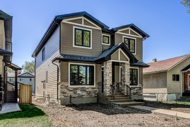 Mid-sized transitional two-story concrete fiberboard exterior home idea in Edmonton