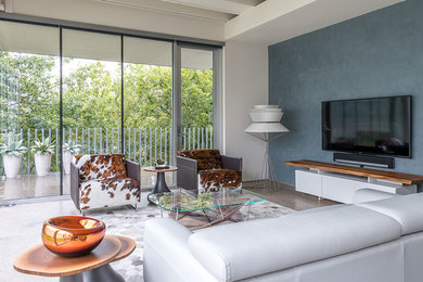 Photo of a contemporary living room in Dallas with grey floor.