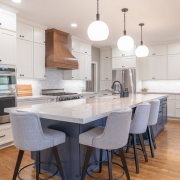 Porcelain Island Kitchen Remodel with Custom Built-Ins + Fireplace Feature