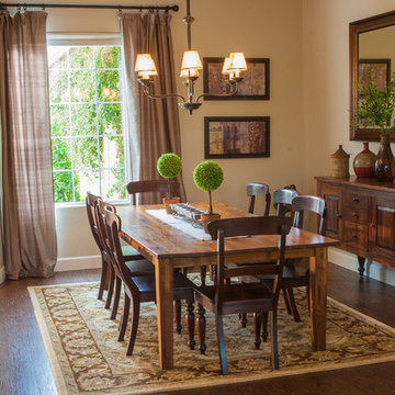 Interior remodel including flooring, stone wall, and lighting.
