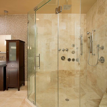 Use of Glass, Light and Fixtures Sets Leesburg Master Bathroom Apart
