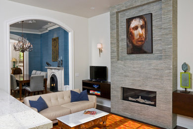 Inspiration for a mid-sized transitional formal and enclosed dark wood floor and gray floor living room remodel in Chicago with white walls, a standard fireplace, a tile fireplace and a tv stand