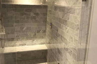 Example of a huge trendy master gray tile and subway tile mosaic tile floor bathroom design in New York with shaker cabinets, white cabinets, a two-piece toilet, gray walls, an undermount sink and granite countertops