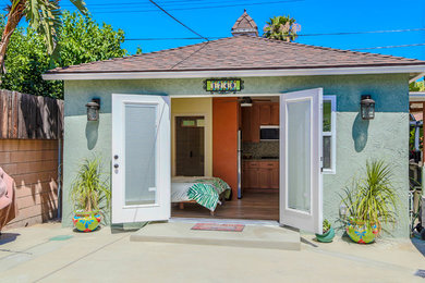 Garage - mid-sized transitional detached two-car garage idea in Los Angeles