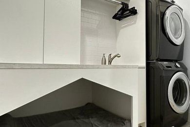 Inspiration for a mid-sized modern laundry room remodel in Dallas