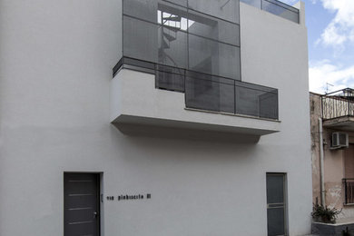 Idee per la facciata di una casa bianca contemporanea a due piani di medie dimensioni con tetto piano