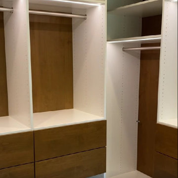 Modern Master Closet with Lighting and Drawers