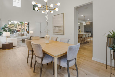 Example of a transitional dining room design in San Diego