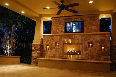 Inspiration for a mid-sized contemporary backyard concrete patio remodel in Portland with a roof extension