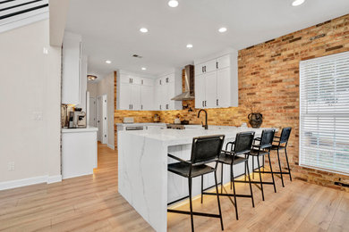 Example of a mid-century modern kitchen design in Other