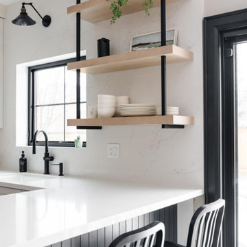 Bright Black & White Kitchen with Natural Wood Elements