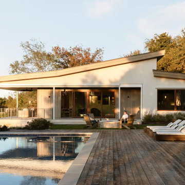Elegant Pool House Overlooking Backyard Oasis