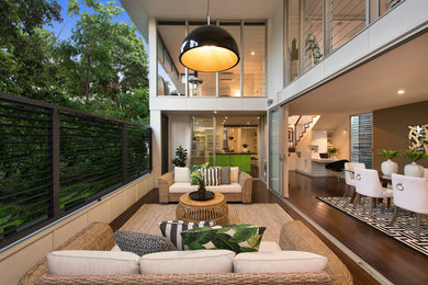 Tropical deck in Brisbane with a roof extension.