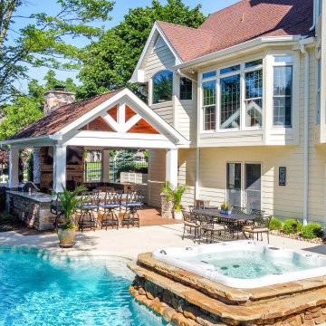 Pool Side Covered Patio with Fireplace and Bar Area