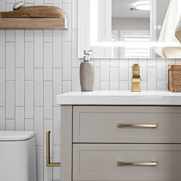 Taupe Bathroom Vanity with Gold Faucet and Minimalist Decor