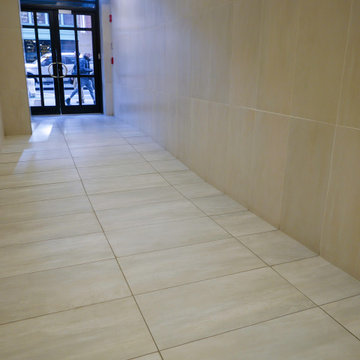 Gentle slopes resolve the floor height & respect ADA.