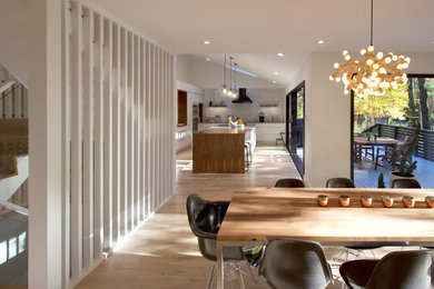 Inspiration for a large contemporary light wood floor and beige floor kitchen/dining room combo remodel in Philadelphia with white walls and no fireplace