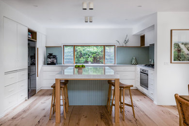 Photo of a mid-sized beach style kitchen in Melbourne.