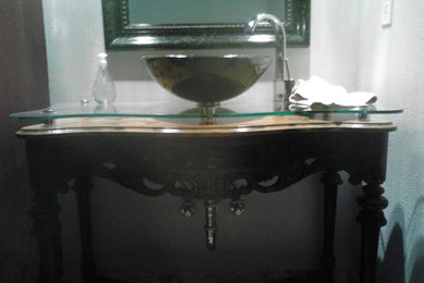Bathroom - mid-sized 3/4 bathroom idea in Denver with a vessel sink, glass countertops and white walls