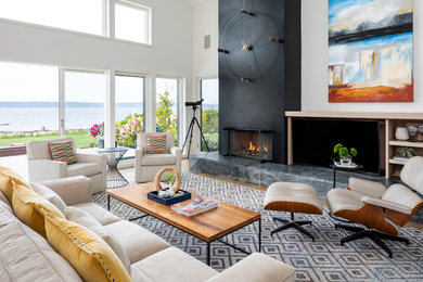Example of a beach style home design design in Seattle