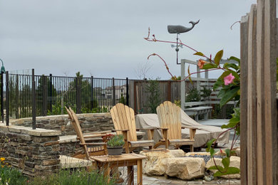 Beach style home design photo in Other