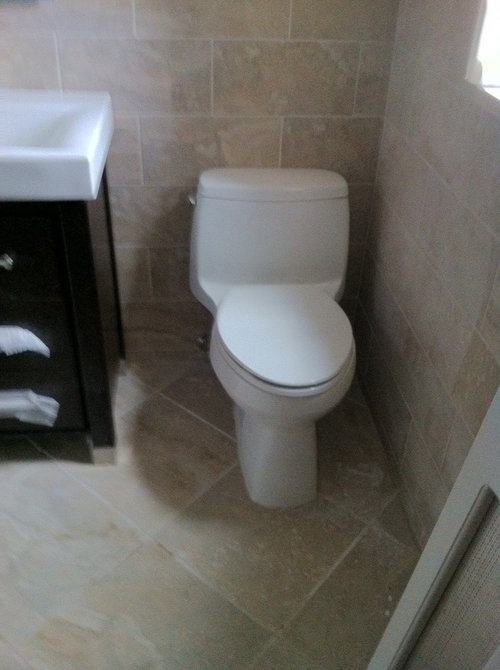 Placement for toilettissue holder and handtowel ring?