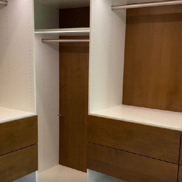Modern Master Closet with Lighting and Drawers