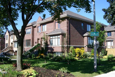 Contemporary exterior home idea in Montreal