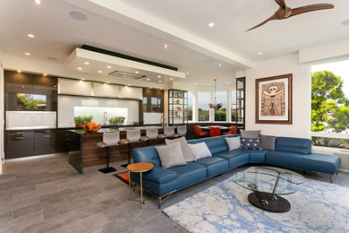 Living room - mid-sized contemporary open concept porcelain tile and gray floor living room idea in San Diego with white walls, a ribbon fireplace, a stone fireplace and a wall-mounted tv