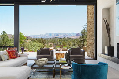 Inspiration for a contemporary open concept gray floor living room remodel in Phoenix with beige walls