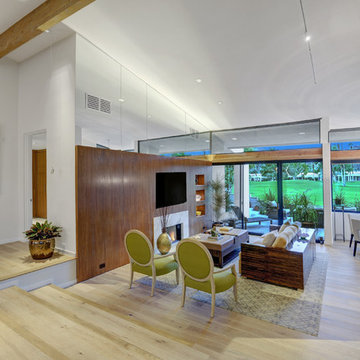 LR with architectural matched figured walnut paneling