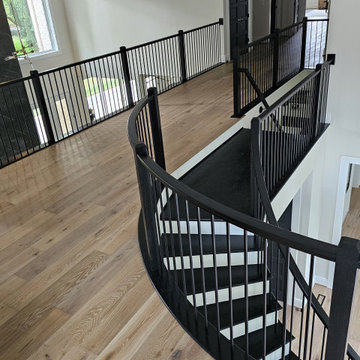 Project #130 | Curved Staircase with Wraparound Balcony