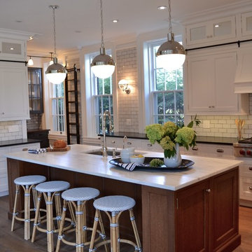 White Kitchen with Wood Floor and Quarter Sawn Oak Island with White Countertop
