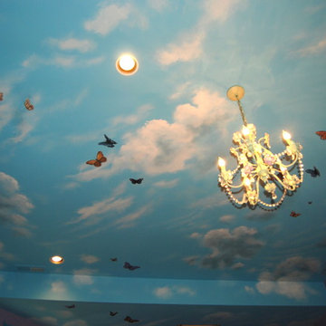 Sky Ceiling Mural with Butterflies, hand-painted in a bedroom by Mural Art LLC.