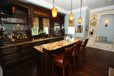 Mid-sized elegant open concept dark wood floor living room photo in Orlando with blue walls, a standard fireplace, a plaster fireplace and no tv