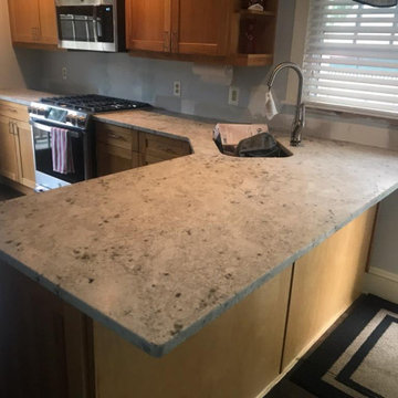 12866 - Colonial White Leathered Granite Project