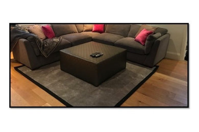 Design ideas for a medium sized modern living room in Hertfordshire with grey floors.