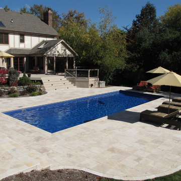 Libertyville, IL. Fiberglass swimming pool with auto cover