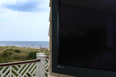 Inspiration for a large coastal rooftop deck remodel in Philadelphia with a pergola
