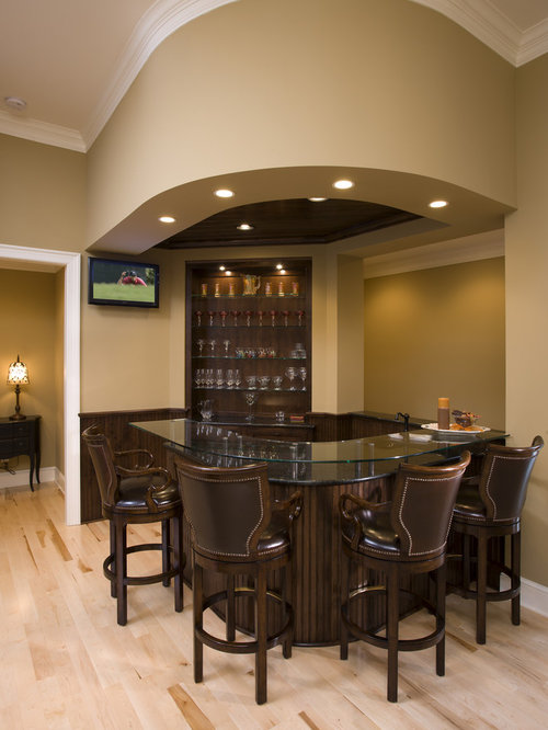 Inspiration for a timeless u-shaped seated home bar remodel in 
