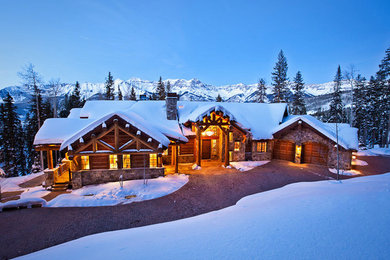 Mid-sized rustic brown one-story mixed siding exterior home idea in Denver