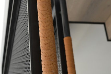 Leather wrapped handles on sliding art screen