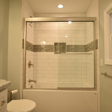 Subway Tile/ Faux Wood Plank Bath