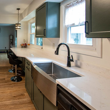 Painted Sage Kitchen with Carrara Breve Quartz countertops