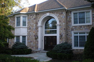 Example of a classic exterior home design in New York