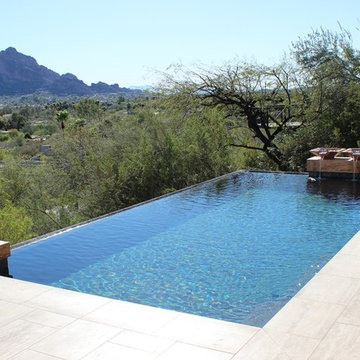 Modern Pool Design with Espresso Vein-Cut Tile