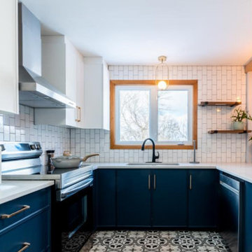 Coastal Kitchen with Subtle Color Contrast and Large Windows