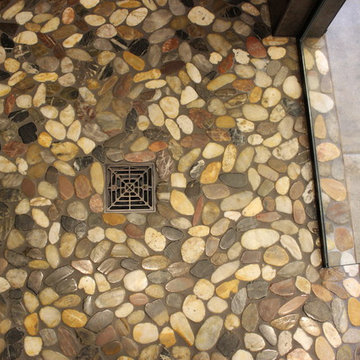 Moline, IL Bath Remodel With Gray Stained Cherry Vanity and Pebble Tiled Shower