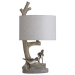 StyleCraft - Iuka Farmhouse Birds On A Limb Table Lamp, Heathered Oatmeal Fabric Shade - This lovely table lamp delivers farmhouse style in a classic form. The polyresin structure showcases a pair of birds and branches that scale up to support the shade. The resin features neutral tones in its finish, while the drum shade complements with its heathered oatmeal coloring. A slice of life that's not overstated, this charming fixture is a great source of natural beauty.